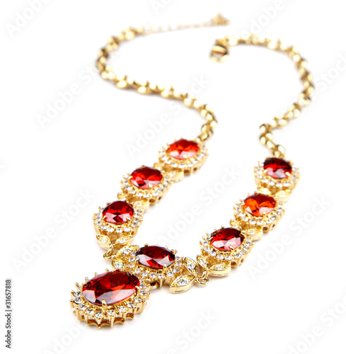 gold necklace with gems isolated