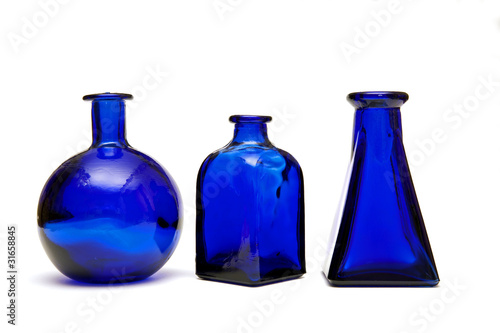 three blue bottles