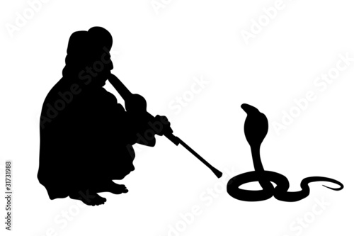 indian fakir sitting with cobra silhouettes