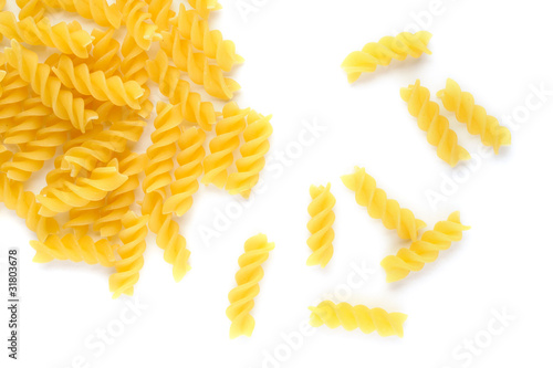 Pasta fusilli on white background