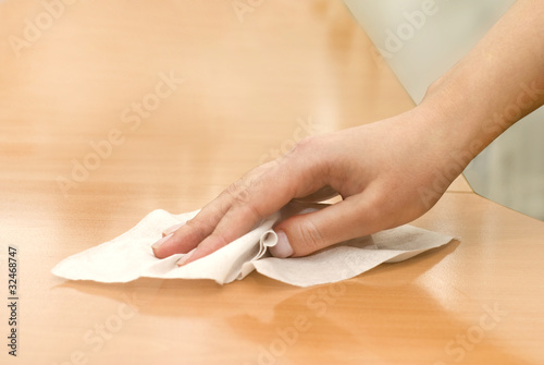 hand with wet wipe