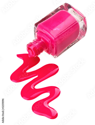 Bottle of pink nail polish with enamel drop samples, isolated on