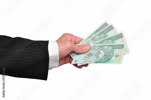 Banknoty podawane ręką