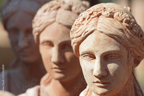 traditional tuscan earthenware garden sculptures closeup