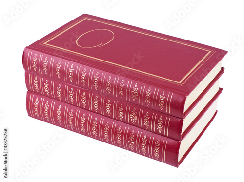 Horizontal pile of three red books