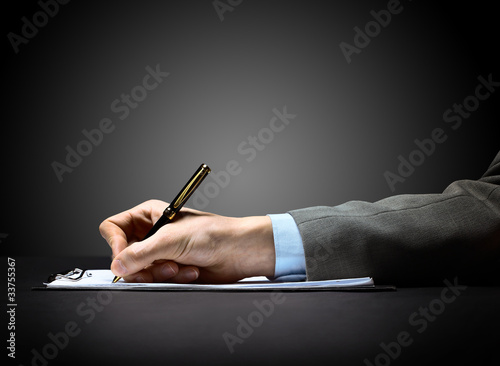 businessman's hand with pen