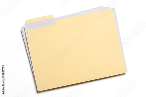 Documents stuffed in Manila folder isolated on white