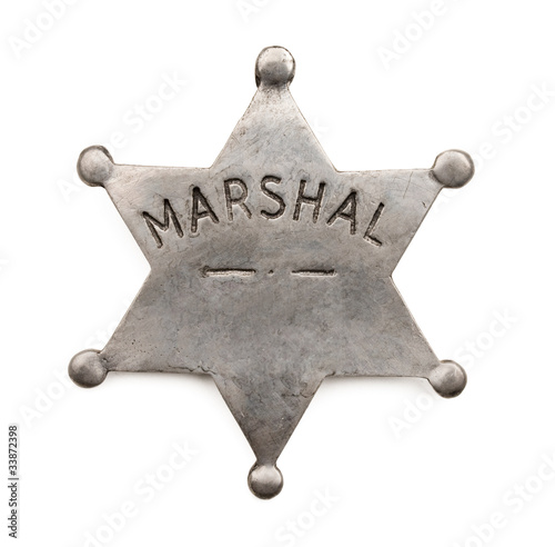 Vintage six point marshal star badge isolated on white