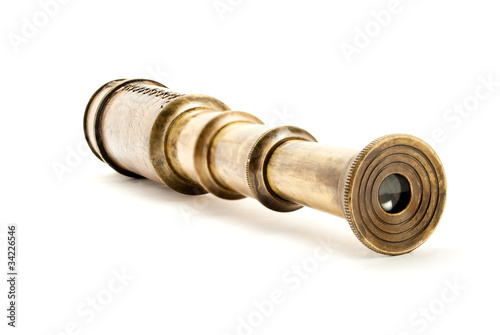 Antique spyglass, isolated on white.
