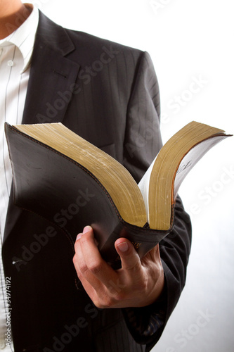 A man reading from the holy bible