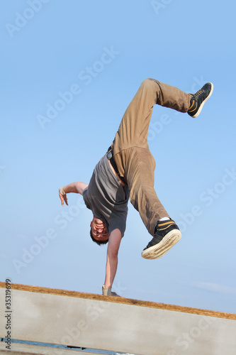 male breakdancer on natural background