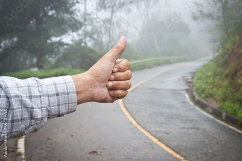 Hand of hiker man at rural