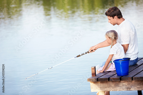 Father and daughter go fishing