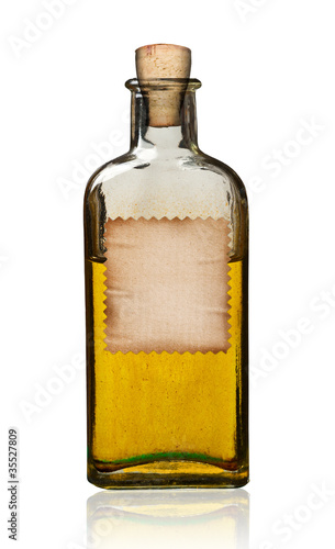 Old fashioned drug bottle with label, isolated.