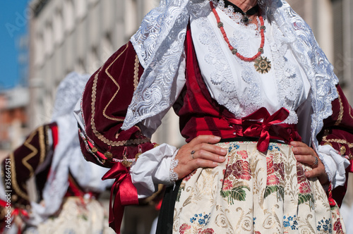 Sardinia, Italy: Redentore festival. Detail of a dress