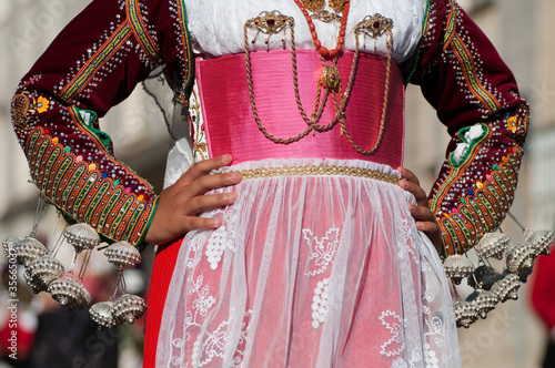 Sardinia, Italy: Redentore festival. Detail of a dress