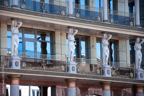 Caryatids on the facade of a modern building