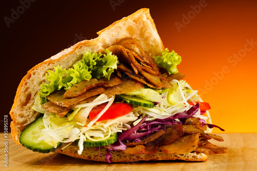 Kebab - grilled meat, bread and vegetables