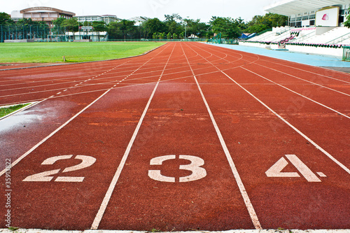 Number two three and four on the start of a running track