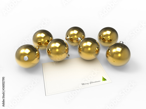 Świąteczne złote bombki i czysta kartka na życzenia