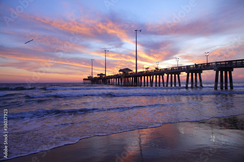 sun rise and long pier