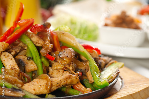 original fajita sizzling hot on iron plate