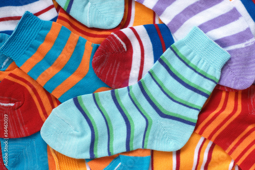 Many pairs of child's striped socks