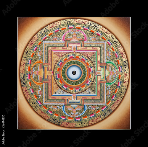 Inner part of ancient tibetan tangka Ohm Mandala on black