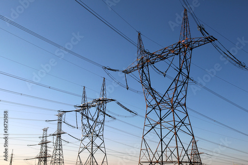 high voltage electrical towers in line
