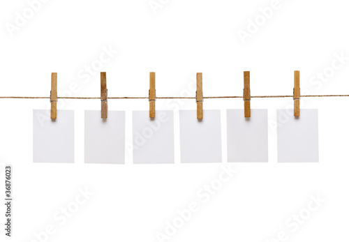 clothes peg and note paper on clothes line rope