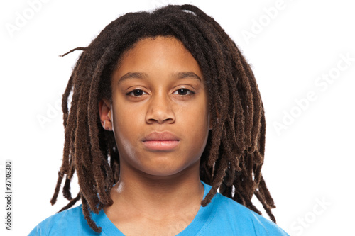 close up portrait of a young rasta boy