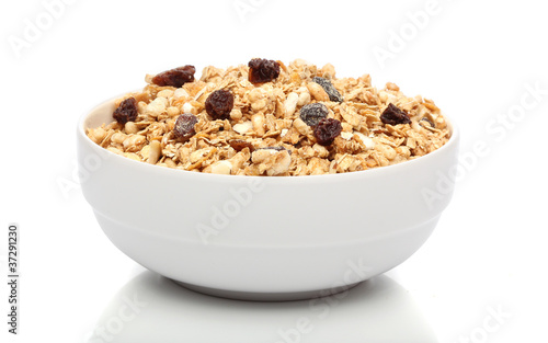 Granola breakfast on a bowl over white background