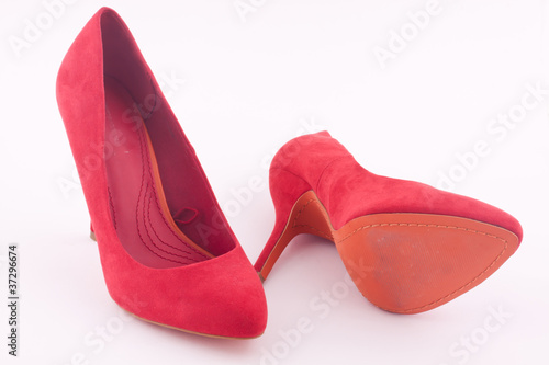 a pair of red heel shoes