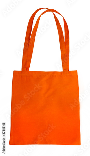 small orange cotton bag isolated on white