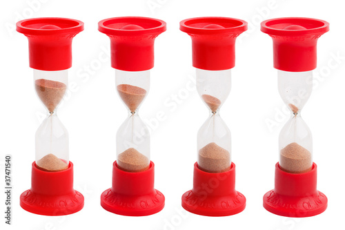 Hourglass with a different balance of sand on white background