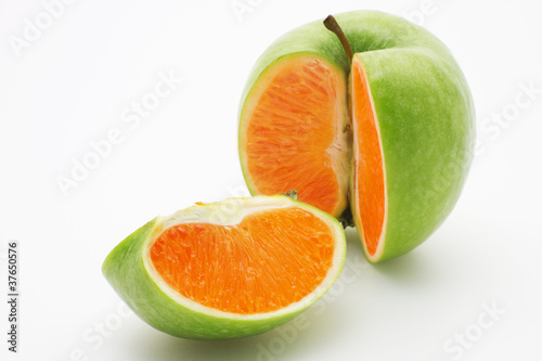 Apple containing an orange