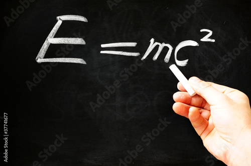 E=mc² Albert Einsteins physical formula on blackboard