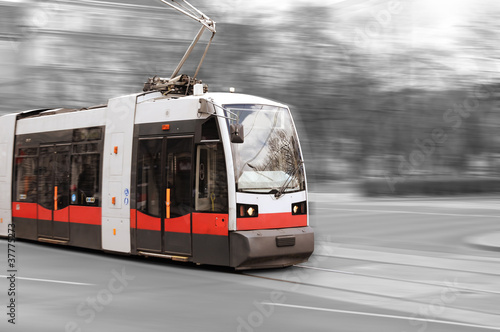 Modern city tram on moving
