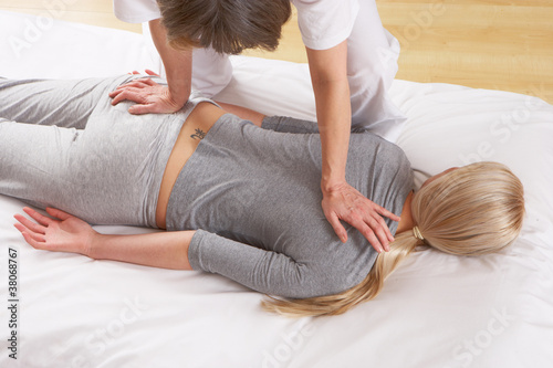 Woman having Shiatsu massage