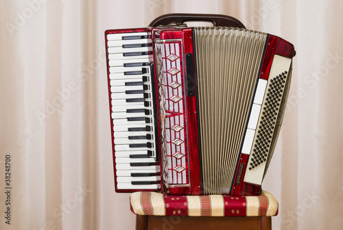 An old retro accordion is waiting for the player.