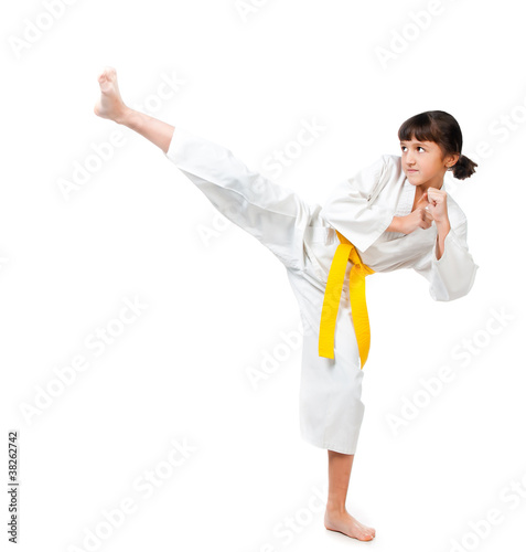 little girl in a kimono with a yellow sash