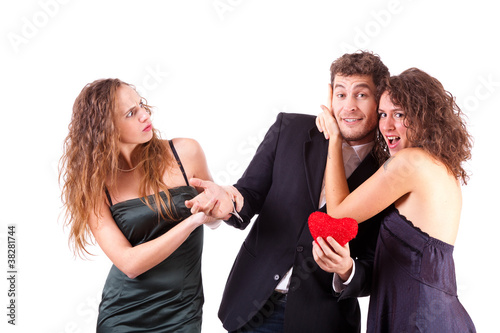 Handsome Man with two Women Flirting