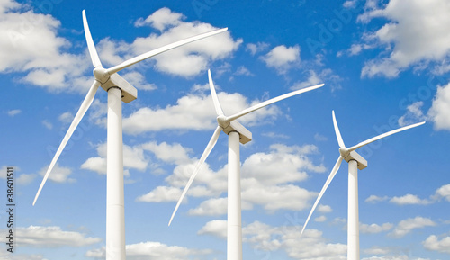 Three wind turbines - against the sky