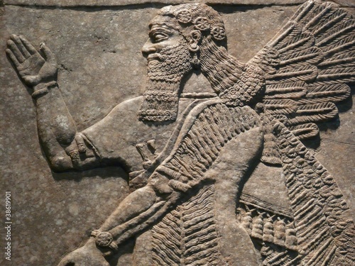 Ancient Assyrian wall carving of a man