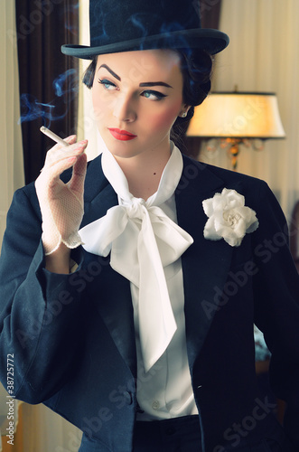 Beautiful girl in old suit