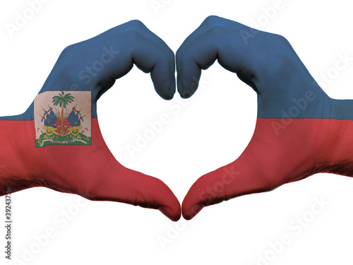 Heart and love gesture in haiti flag colors by hands isolated on