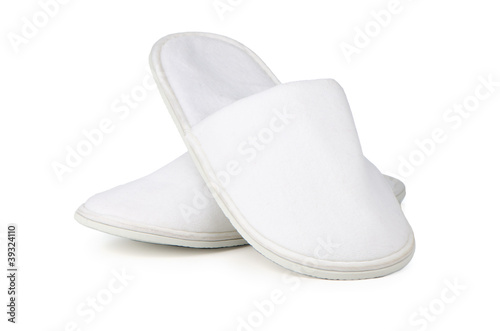A pair of white slippers