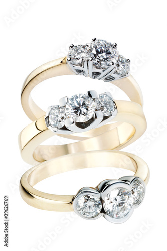 Three gold rings with Diamonds