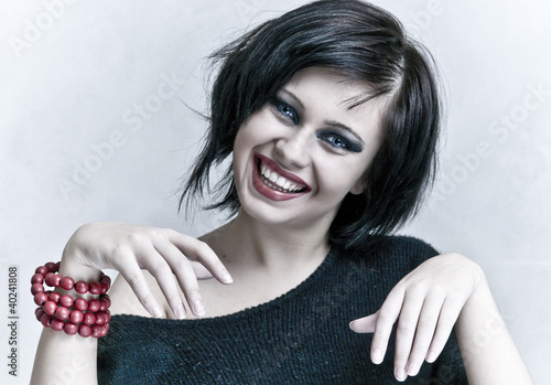 smiling woman portrait with white teeth and red lipstick