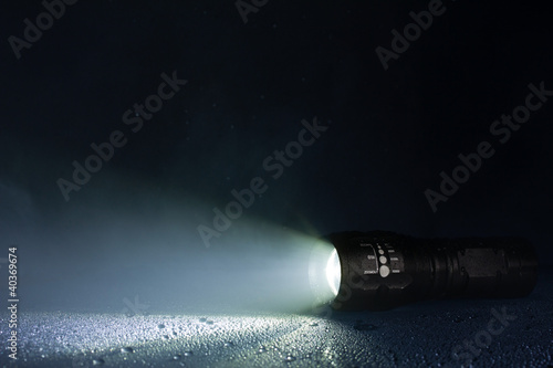 Tactical waterproof flashlight with waterdrops and smoke